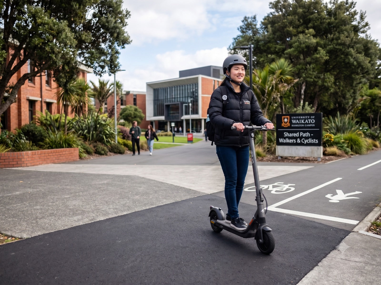 Electric scooter rider on Hamilton footpath following NZ road rules