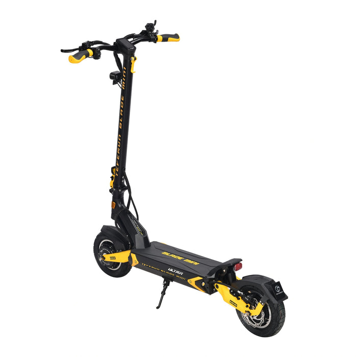 Black/Yellow - foot deck equipped with a high-traction rubberized grip mat and integrated LED accent lighting along the sides.