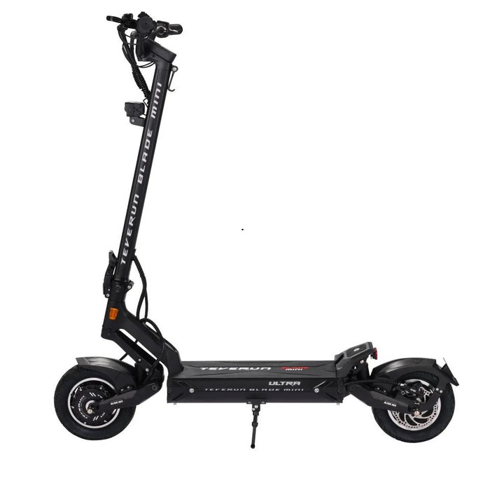 Black - Teverun Blade Mini Ultra V2 electric scooter parked against a clean city background, showcasing its striking dual-tone frame.